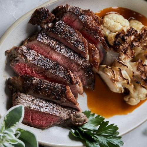 Grass-Fed New York Strip with Tomato Emulsion and Roasted Cauliflower