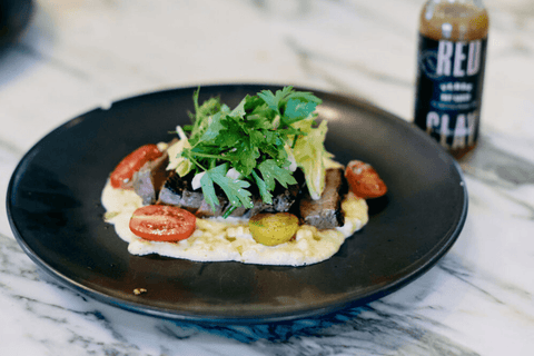 Pan-Seared USDA Prime Sirloin Steak with Creamed Corn and Shaved Fennel Salad Drizzled