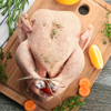 Uncooked Market House turkey on a cutting board 